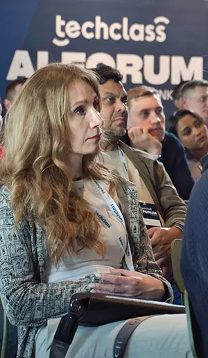 Participants listening to a session at the TechClass AI Forum