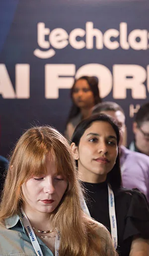 Audience members during a talk at the TechClass AI Forum